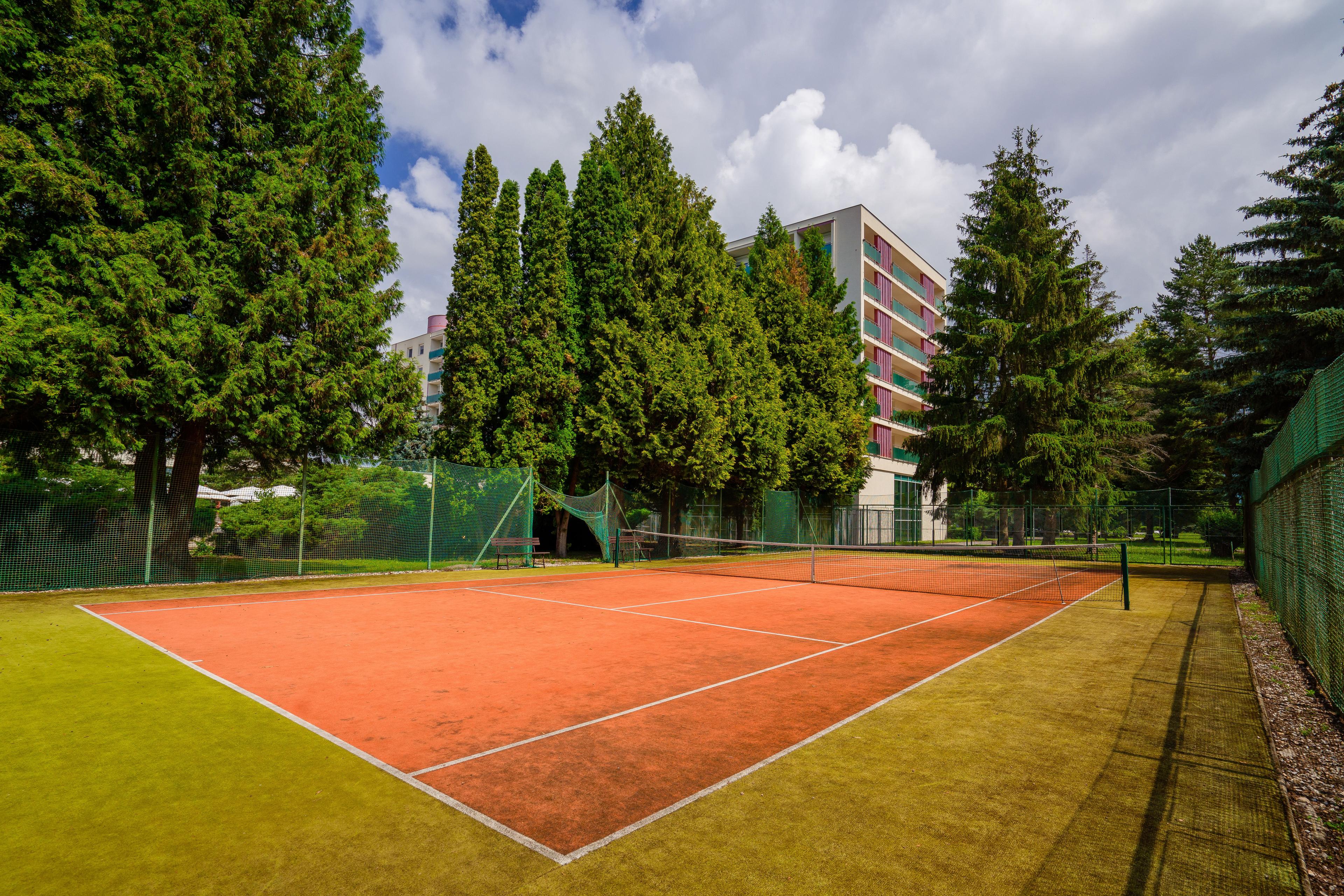 tennis court in front of the hotel
